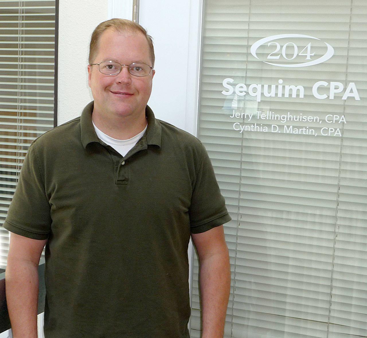 Jerry Tellinghuisen, a certified public accountant, welcomes new clients to Sequim CPA. He and his partner Cynthia D. Martin opened the business in June. Sequim Gazette photo by Patricia Morrison Coate
