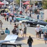 Community members enjoy a classic car show in Sequim on Aug. 19, &ldquo;Sequim Prairie Nights.&rdquo; Sequim Gazette photo by Michael Dashiell