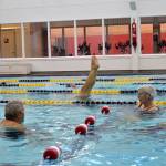 Rena and Bill Keith, on left, and Margaret and James McAllister, on right, chat in the YMCA of Sequim&rsquo;s pool while someone spins in the lane next to them Monday. Sequim Gazette photo by Matthew Nash