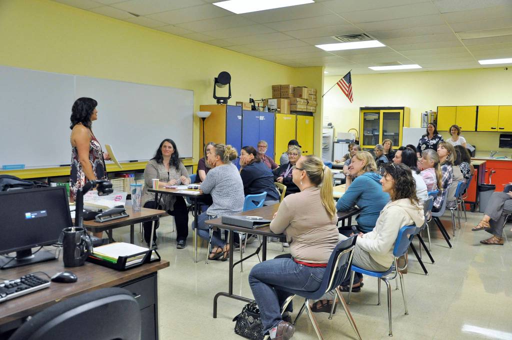 Olympic Peninsula Academy parents receive instruction from Kim Glasser during Otter Day. Photo by Patsene Dashiell