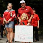 Kaylee Kinsey, a Helen Haller Elementary School teacher, and fiancé Kyler McCaslin and Kinsey&rsquo;s daughter Pepper Giffin, a kindergartner at Helen Haller, join Sequim staffers outside the Sequim School District boardroom on Sept. 5. Sequim Gazette photo by Michael Dashiell
