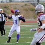 SHS quarterback Riley Cowan looks for a receiver downfield in the first quarter of the Wolves&rsquo; Sept. 8 game at Montesano. Sequim Gazette photo by Michael Dashiell