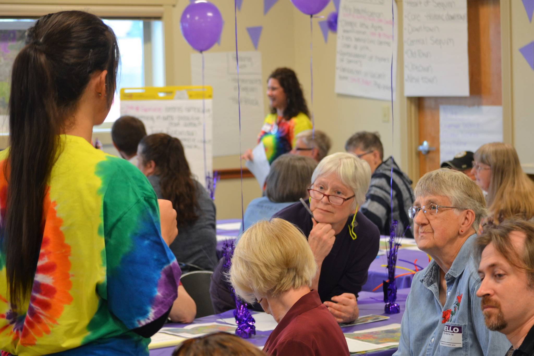 Sharon Quesnell and Priscilla Hudson listen in on a discussion about Downtown Sequim on Sept. 9 at the City of Sequim&rsquo;s Neighborhood Visioning Meeting in the Guy Cole Center. Quesnell said city staff &ldquo;have done a good job of getting people involved.&rdquo; &ldquo;What they&rsquo;re doing is a good start,&rdquo; she said. Sequim Gazette photo by Matthew Nash