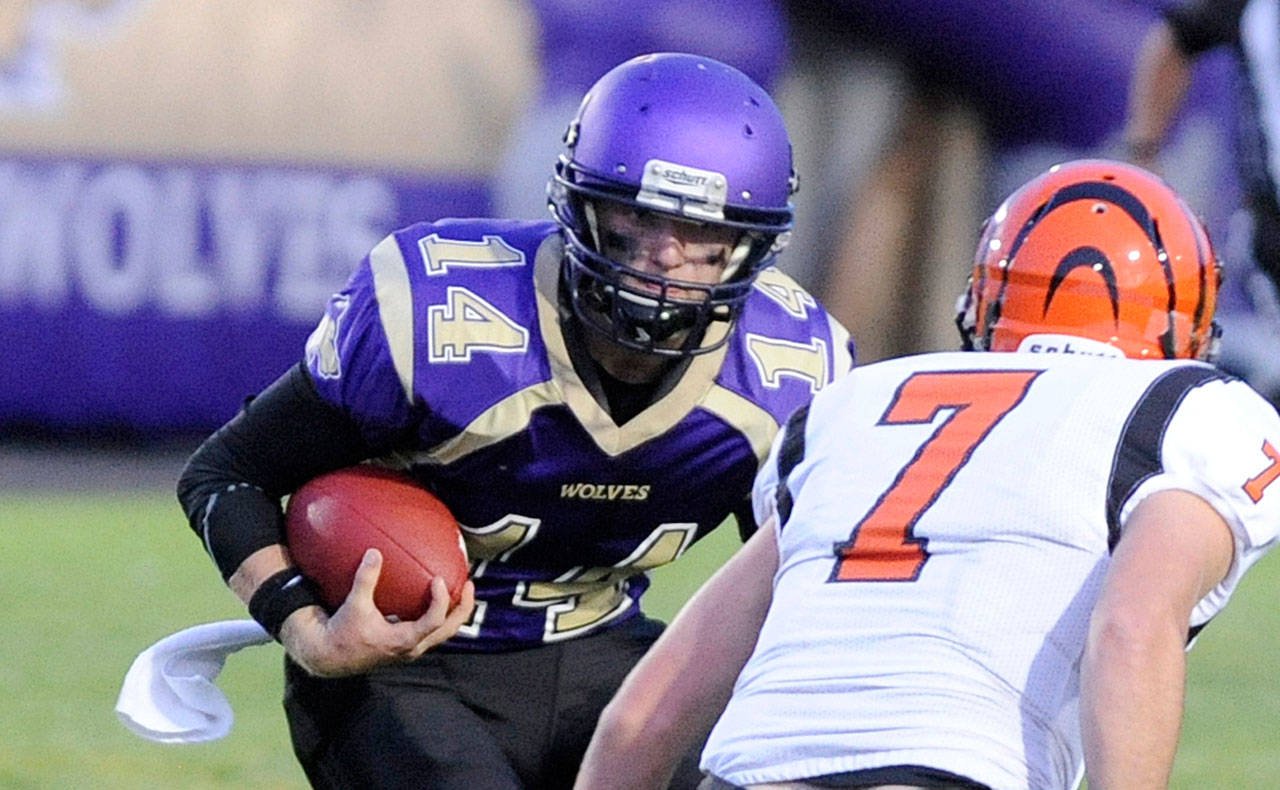 Football: Wolves complete wild comeback to tame Centralia’s Tigers