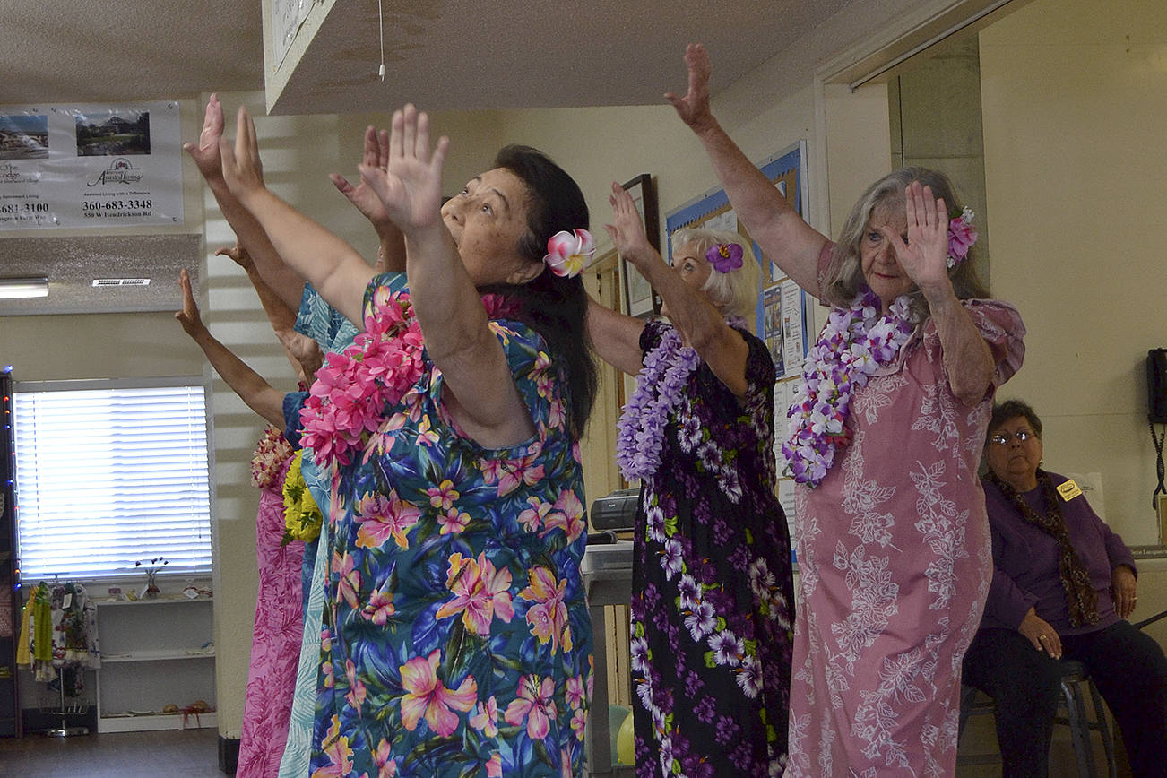 Members of the Shipley Center&rsquo;s Na Hula &lsquo;O Wahine &lsquo;Ilikea perform a hula dance for a large audience on Sept. 15, for the center&rsquo;s open house. Sequim Gazette photo by Matthew Nash