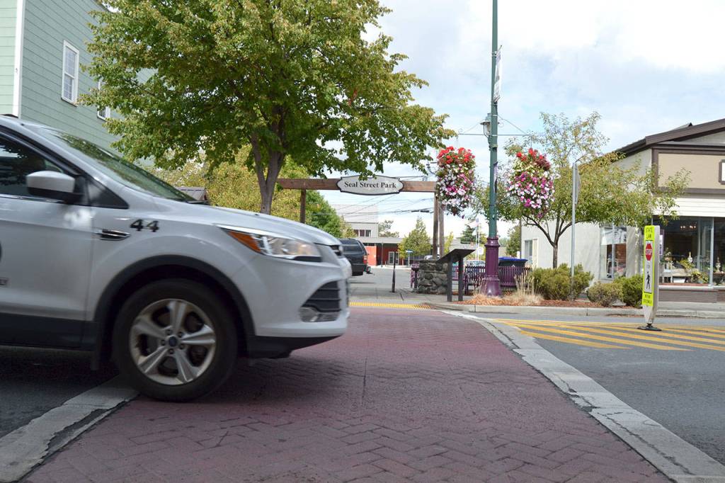 According to a consultants&rsquo; study for the City of Sequim, crosswalks like this west of Sequim Avenue on Washington Street are good for pedestrians but also contributing to slowing traffic flow east-west. Sequim Gazette photo by Matthew Nash