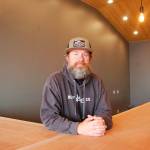 Agnew resident Sean O&rsquo;Neill talks about the opening of his new business Peninsula Taproom at the intersection of West Washington Street and N. 2nd Avenue that will open the first week of October. He is looking to serve craft beer, cider and wine by the glass in a coffee shop style venue with bar and bench seating, cozy lighting and outlets to charge electronic devices. Sequim Gazette photo by Erin Hawkins