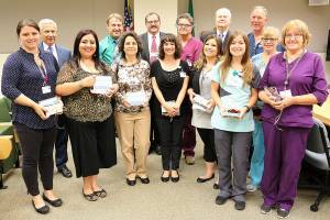 Milestone: OMC staffers receive recognition awards