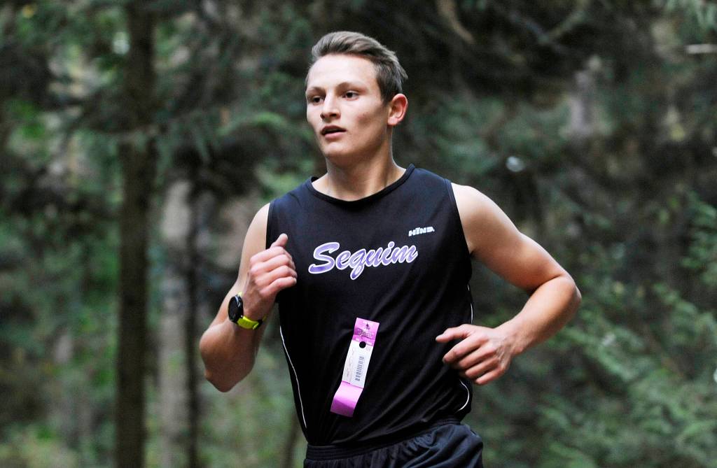 Sequim&rsquo;s Murray Bingham takes top honors at an Olympic League meet in Sequim on Oct. 4, as the Wolves top North Mason and Bremerton. Sequim Gazette photo by Michael Dashiell