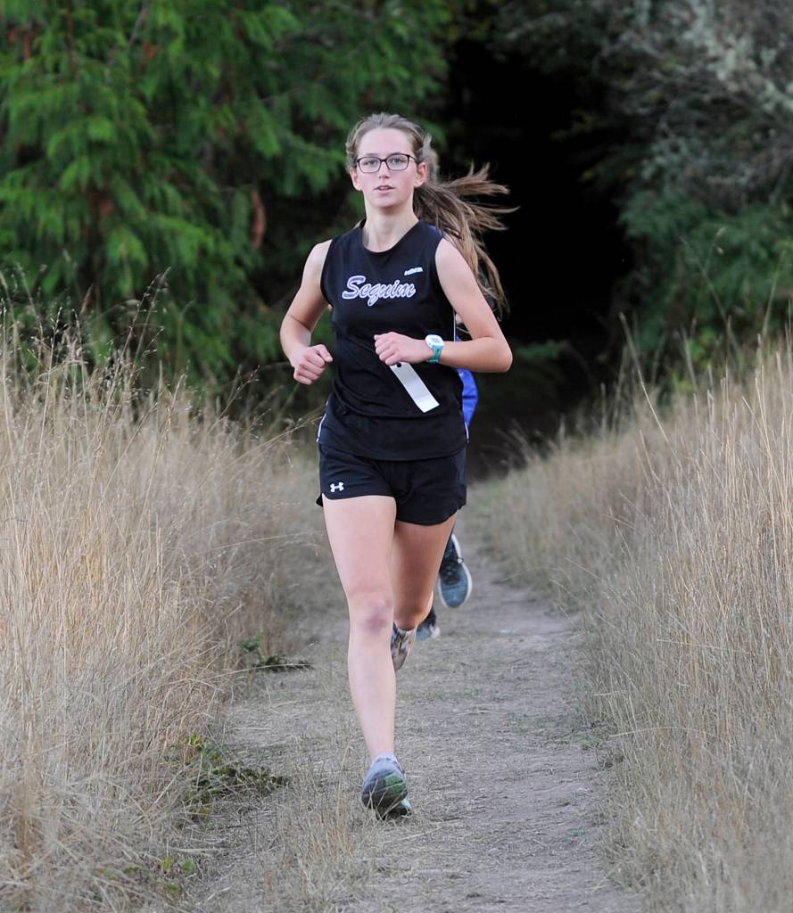 Sequim&rsquo;s Kaitlin Viada helps Sequim to league wins against North Mason and Bremerton on Oct. 4. Viada placed third on Sequim&rsquo;s home course, finishing in 25:34. Sequim Gazette photo by Michael Dashiell