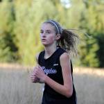 Sequim freshman Jessica German makes her way up the meadow hill in the Wolves&rsquo; Olympic League meet on Oct. 4 at Robin Hill County Park. German placed fourth overall in 26:30. Sequim Gazette photo by Michael Dashiell