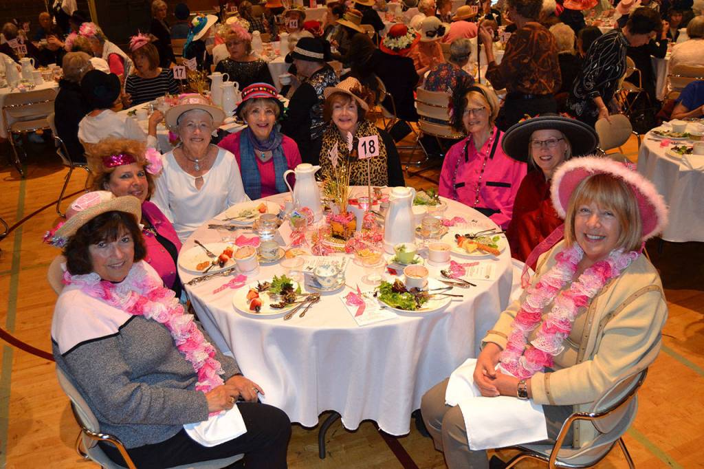 A group of friends from the Bell Hill area gather for a photo at the 20th Mad Hatter&rsquo;s Tea on Oct. 6. Sequim Gazette photo by Matthew Nash