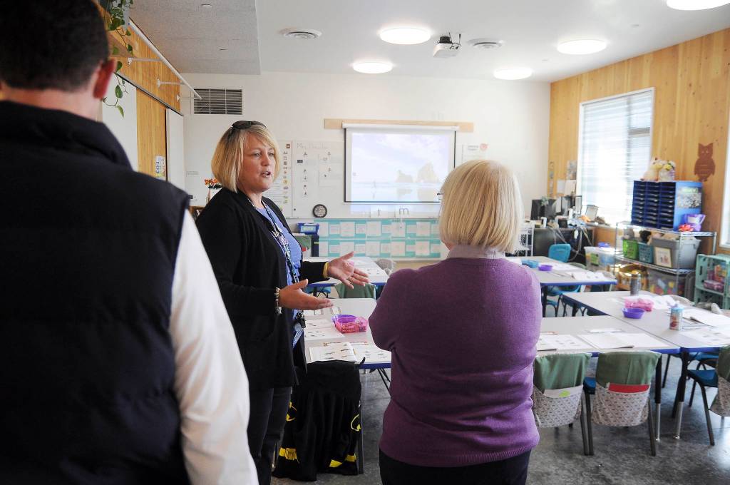 Greywolf Elementary School principal Donna Hudson, center, gives U.S. Sen. Patty Murray a tour of the school&rsquo;s cross-laminated timber (CLT) building on Oct. 11. Sequim Gazette photo by Michael Dashiell