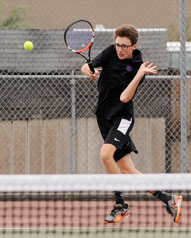 Boys tennis: Wolves cap regular season by topping Trojans