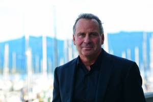 Ethan Wayne, whose father is the namesake of John Wayne Marina, visited Saturday to honor former Port of Port Angeles Executive Director Jerry Hendricks, who was instrumental in moving the marina project forward. (Jesse Major/Peninsula Daily News)