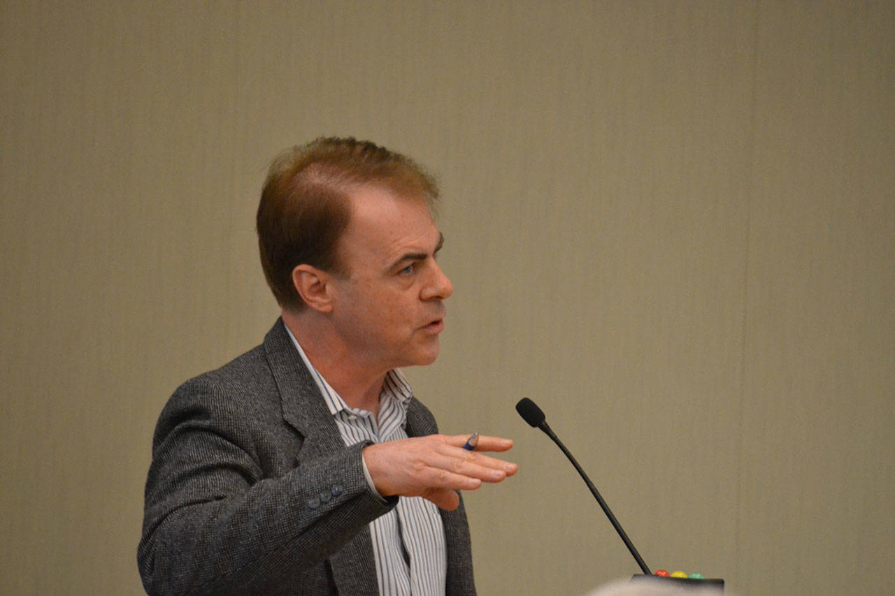 Bob Schroeter, executive director and CEO of the Clallam County Economic Development Corporation, EDC, speaks to Sequim city councilors on Sept. 11 about how he plans to measure his agency&rsquo;s success for the city. Some of that includes quarterly reports to city councilors and required visits with businesses and nonprofits. Sequim Gazette photo by Matthew Nash