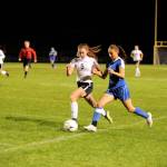 Sequim&rsquo;s Mary McAleer looks to take the ball away from Bremerton&rsquo;s Abigail Dubeau on Oct. 23. The Wolves went on to win 1-0 and finish their regular season tonight, Oct. 25, in Kingston. Sequim Gazette photo by Matthew Nash