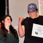 Luke Silliman celebrates winning the audience choice award, or the Elkie, at the Sequim Education Foundation&rsquo;s Student Film Festival on April 21, in Sequim High School with his friend Emma Gallaher. Their film &ldquo;Welcome to Life&rdquo; also won first place and a $1,000 scholarship. Silliman was recently in an accident where he fell from a bridge near his college in Chicago. Sequim Gazette file photo by Matthew Nash