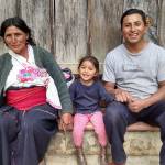 Three generations of a Maya family pose for a photograph. Mujeres de Maíz Opportunity Foundation sponsors a children&rsquo;s program in their community. (Judith Pasco)