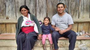 Three generations of a Maya family pose for a photograph. Mujeres de Maíz Opportunity Foundation sponsors a children&rsquo;s program in their community. (Judith Pasco)
