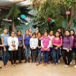 Current scholarship recipients of Mujeres de Maíz Opportunity Foundation stand for a group photograph. (Judith Pasco)
