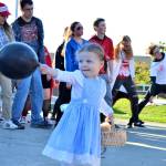 Briella Gleason, 1 ½ of Sequim dances along with the Sequim High School Choir as they sing tunes from &ldquo;The Nightmare Before Christmas.&rdquo;