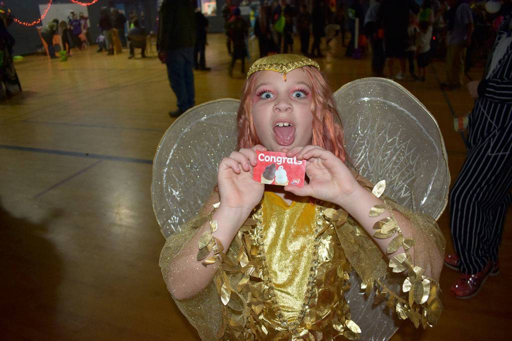 Olive Young celebrates being a winner in the Boys & Girls Club&rsquo;s costume contest on Oct. 28. Photo courtesy of Dave Miller/ Olympic Peninsula Boys & Girls Club