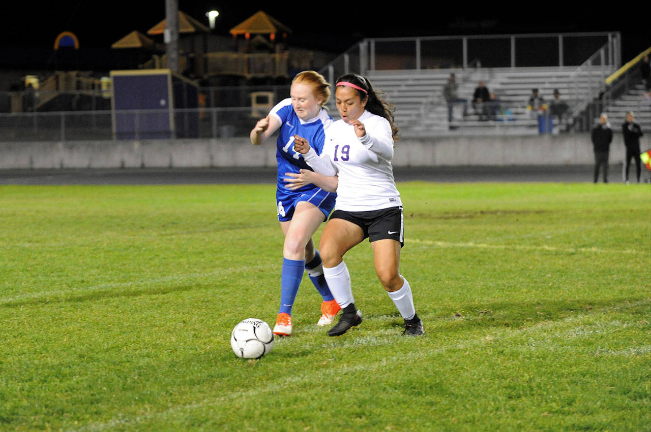 Sequim&rsquo;s Nathalie Torres, right, chases a ball against Bremerton&rsquo;s Lissa Joiner on Oct. 23. Next season, Head Coach Derek Vander Velde said he plans to lean on Torres and others to lead the team. Sequim Gazette file photo by Matthew Nash