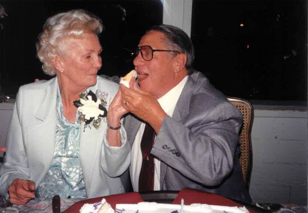 Bill Andrew, 91, and Mary Andrew, 90, hold hands and share their journey of more than 70 years of marriage together at their home in Sinclair Place. Sequim Gazette photo by Erin Hawkins