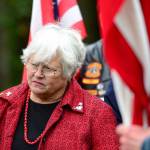Joan Shields-Bennett watches during a memorial service for her late husband, Marvin G. Shields. (Jesse Major/Peninsula Daily News)​
