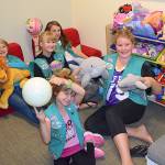 Girl Scouts with Sequim Troop 43870, from left, Johanna Beckerley-Kohl, Sophie Morton, Taylor Heyting, Caydence Barnett, and Paige Krzyworz, take a moment for a photo-op as they remodel the child-friendly space in the Sequim Police Department called Cozy Cove. Photos courtesy of Heidi Krzyworz