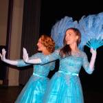 Danielle Lorentzen and Kate Long cast as sisters in Irving Berlins White Christmas flash feathered fans as they sing and dance on stage at Sequim High School Theater. Sequim Gazette photo by Erin Hawkins