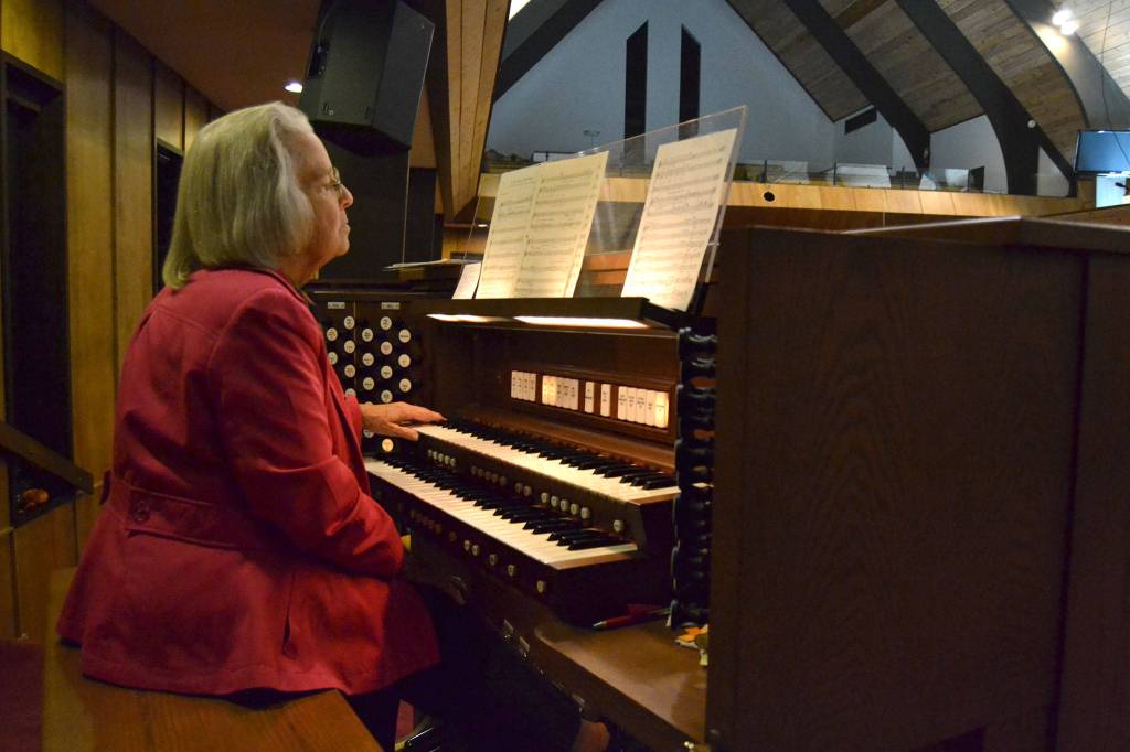 Linda Bauer plays the organ at Sequim Seventh-day Adventist Church as part of the Sequim Community Christmas Chorus. Sequim Gazette photo by Matthew Nash