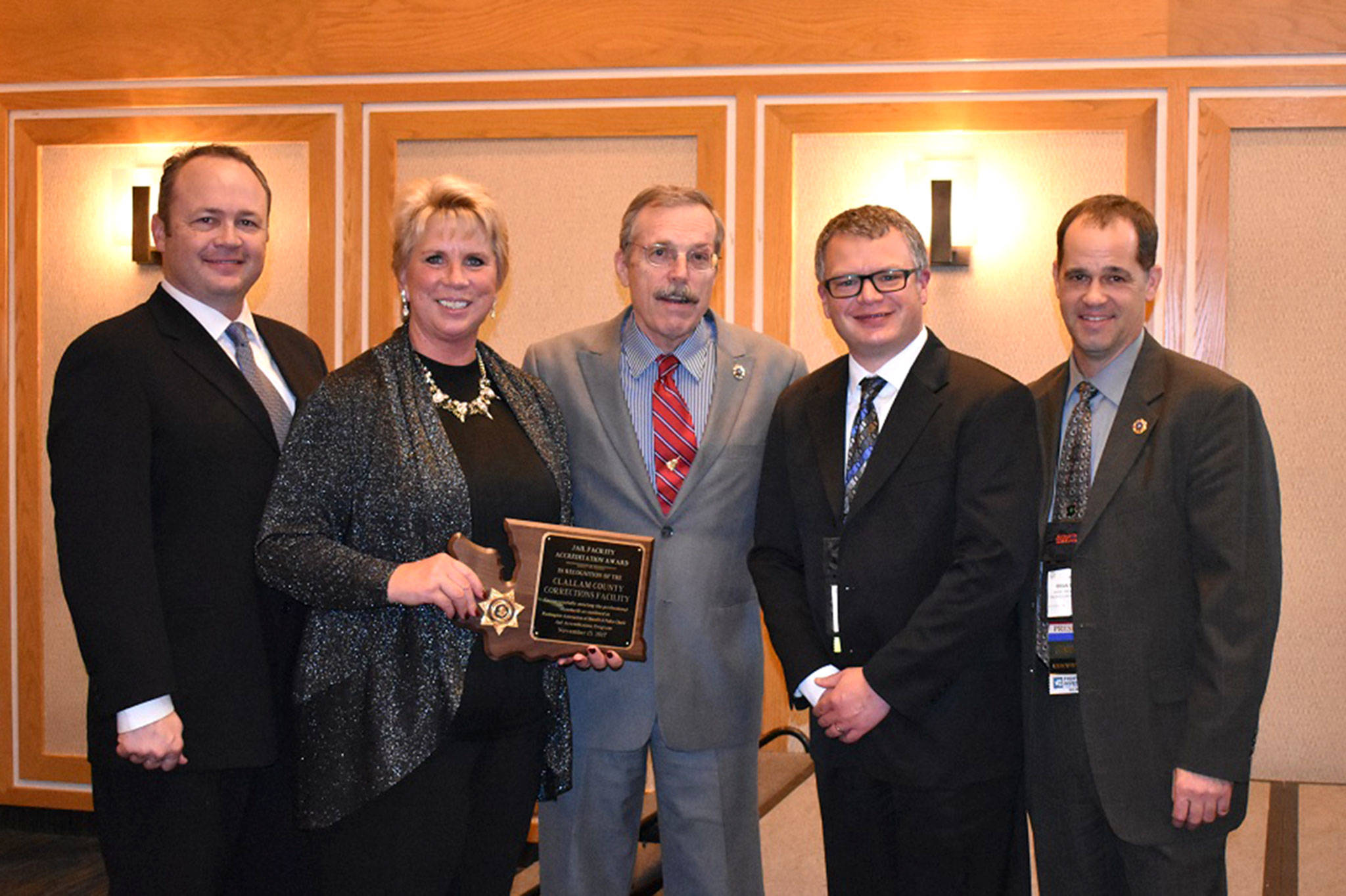 Representatives with the Clallam County Sheriffs Office gather for a photo after receiving accreditation for the Corrections Department at the WASPC awards banquet on Nov. 15. Those at the event include, from left, Corrections Sgt. Don Wenzl, Chief Corrections Deputy Wendy Peterson, Sheriff Bill Benedict, Chief Criminal Deputy Brian King, and Sheriff Brian Burnett (WASPC President). Submitted photo