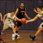 Boys basketball: Glasser leads Wolves to win in opener