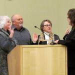 Sequim City Councilors, from left, Pam Leonard- Ray, John Miller, and Candace Pratt take the oath office in Jan. 2016 from Sequim city clerk Karen Kuznek-Reese. Miller died on Nov. 29, and Leonard-Ray said they will have a difficult time filling his shoes with someone with the same connections. Photo courtesy City of Sequim