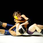 Sequims Jamie Schroepfer attempts to pin Bremertons Alpha Cooper in the Wolves first dual meet. Schroepfer went on to pin him with less than 10 seconds left in the first period on Dec. 5. Sequim Gazette photos by Matthew Nash