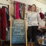 Chelsea Dutta stands in her and her husbands fair trade boutique Ammas Umma in Port Angeles where the proceeds go to families who wish to adopt and adoption efforts. Sequim Gazette photo by Erin Hawkins