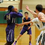 Sequims Keeshawn Whitney, left, and Nate Despan look to break Port Angeles defense down in a Dec. 13 league match-up. Sequim Gazette photo by Michael Dashiell