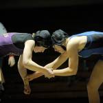 Sequims Kiara Pierson battles Bremertons Haley Michaelson at the Olympic League Girls Dual Meet on Dec. 14. They were deadlocked with no points through the third period until the match ended on an injury after Pierson attempted to take down Michaelson and the Bremerton wrestler landed on her thumb and injured it. Sequim Gazette photo by Matthew Nash