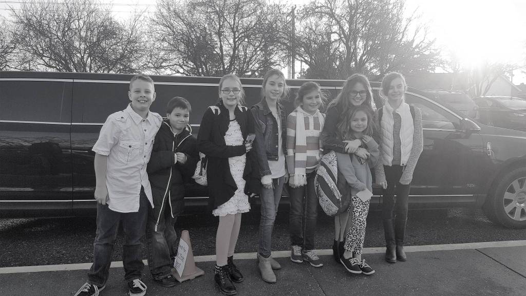Students who go to ride in a limousine, include from left, Austin Francis, Mitchell Vera, Reagan Howe, Lily Despain, Destinie Bernard, Savannah Francis, Haylee Watkins, and Sara German. Savannah raised the most money for the Turkey Trot and won a limo ride. Photo courtesy of Leslee Francis