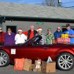 Miata drivers rev up donations to food bank