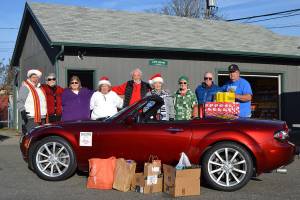 Miata drivers rev up donations to food bank
