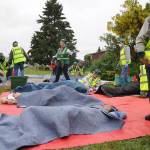 Community Emergency Response Team members treat victims of an earthquake during a June 3 drill. In 2017, about 300 Sequim area residents joined the CERT program and fire officials with Clallam County Fire District 3 hope to get hundreds more in the coming year. Sequim Gazette file photo by Michael Dashiell