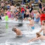 Polar Bear plunging: 150-plus pack PA’s Hollywood Beach for New Year’s dip