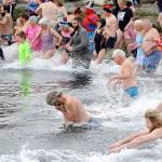 Polar Bear plunging: 150-plus pack PA’s Hollywood Beach for New Year’s dip