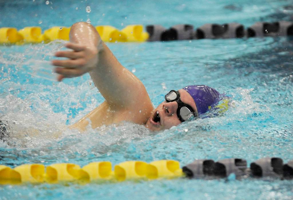 Sequims Kaleb Needoba churns through the water in the 200 freestyle event on Jan. 11. Sequim Gazette photo by Michael Dashiell