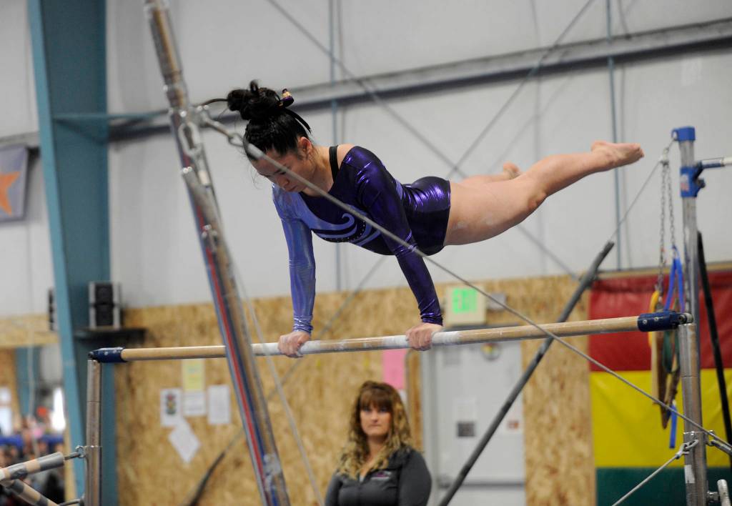 Tumbling together: Trio of Sequim athletes find solidarity, success in cross-peninsula gymnastics squad