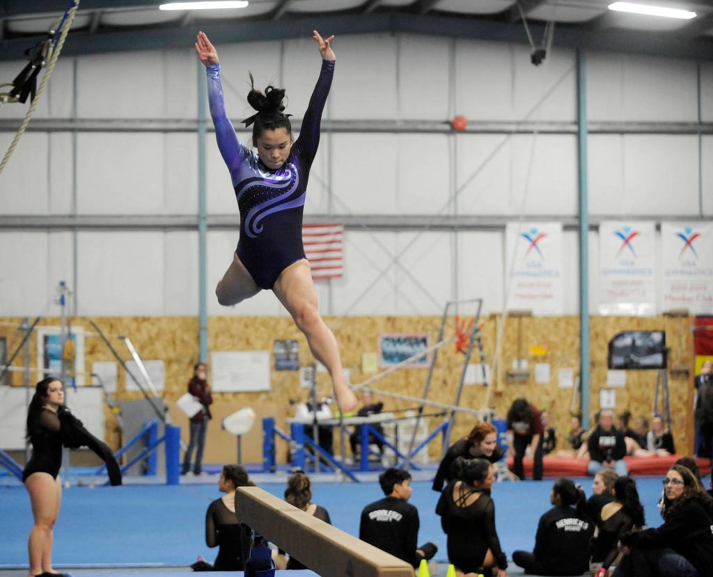 Tumbling together: Trio of Sequim athletes find solidarity, success in cross-peninsula gymnastics squad