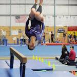 Tumbling together: Trio of Sequim athletes find solidarity, success in cross-peninsula gymnastics squad